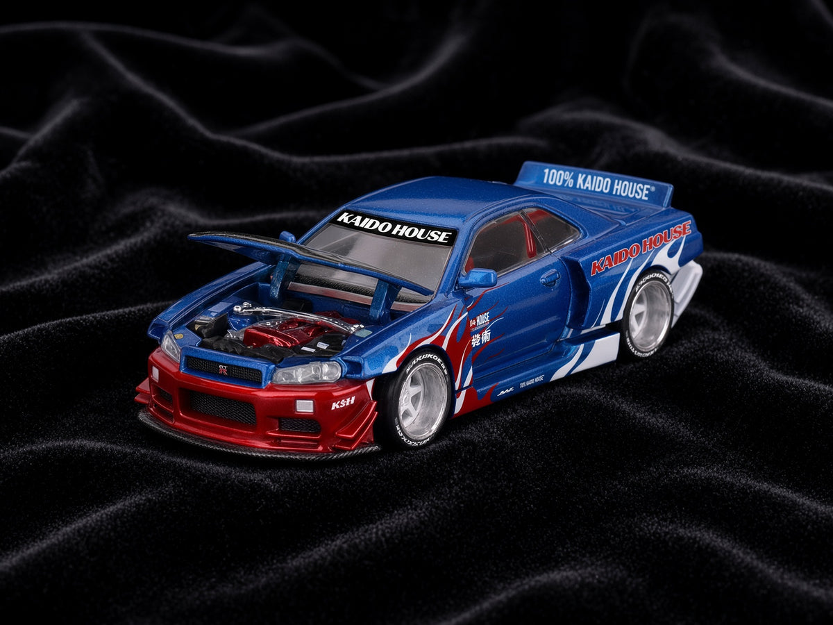 Mini GT – Nissan Skyline GT-R (R34)  Kaido House - Kaido Flames V1 1999 – Blue Red (1:64)
