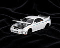 Mini GT – Nissan Skyline GT-R (R33) 1995 Greddy GR33 V1 – White (1:64)