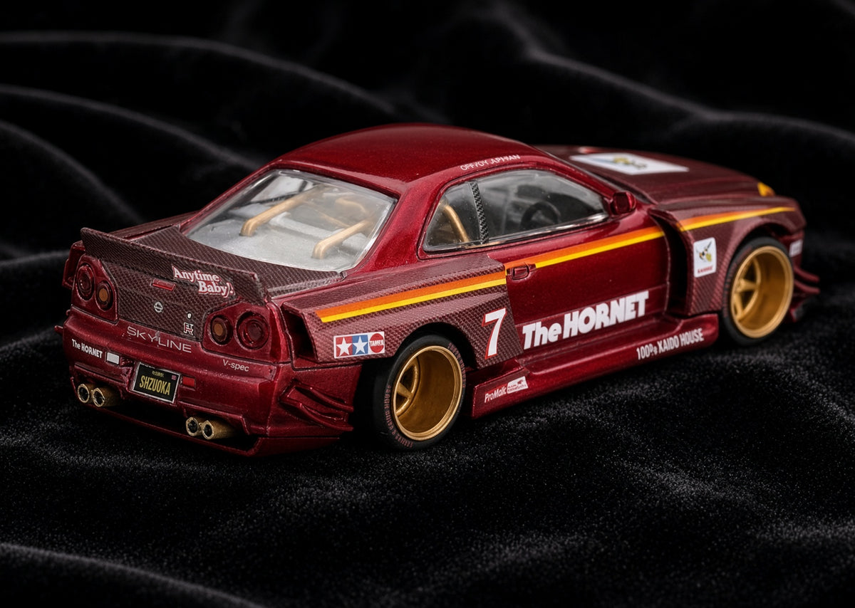 Mini GT - Nissan Skyline GT-R (R34) Tamiya X Kaido House "The Hornet" V2 1999 - Red (1:64)